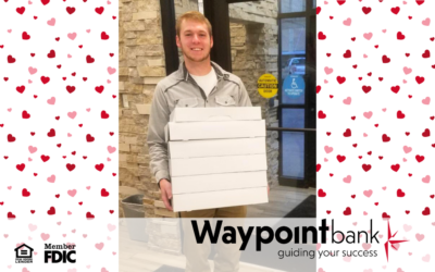 Levi Watson from Waypoint Bank – Cambridge Hands Out Treats for Valentine’s Day